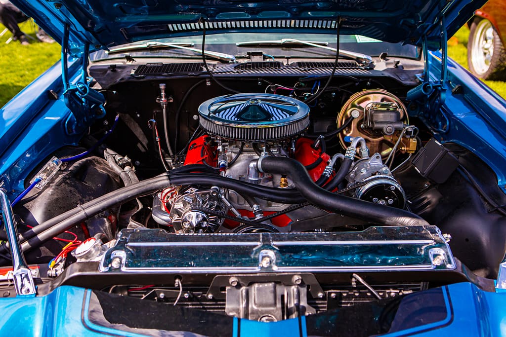 classic american muscle car under hood