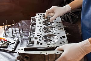 auto mechanic working in garage. repair service.